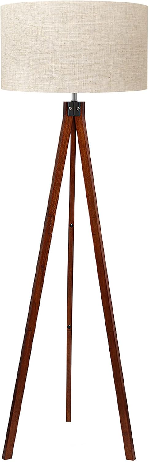 LEPOWER wooden tripod floor lamp glowing in a warm living room